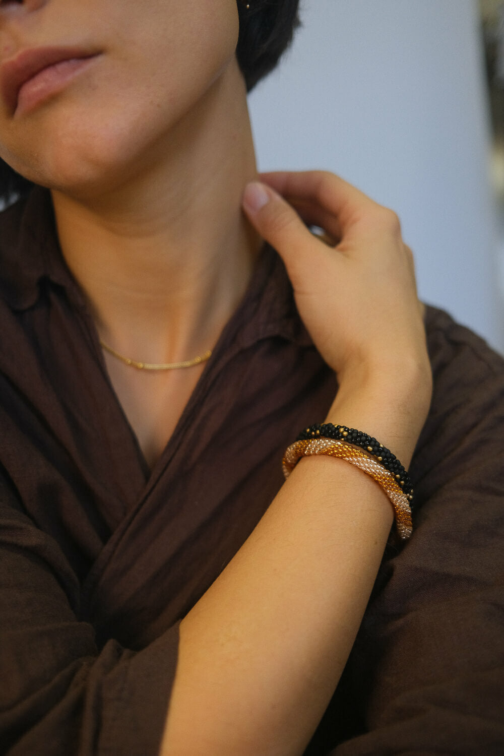 TWISTER - Roll-on bracelet gold peach